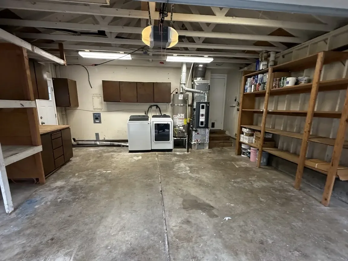 Garage after JunkPDX removed the agreed contents, leaving clear floor space
